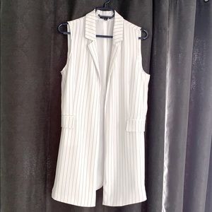 Long over dress sleeveless jacket